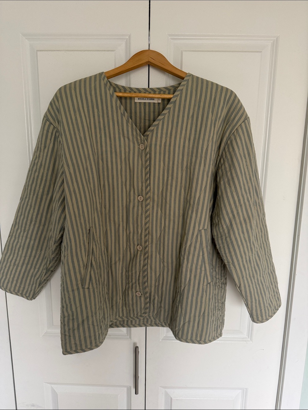 Micaela Greg muted stripe quilted liner sz L